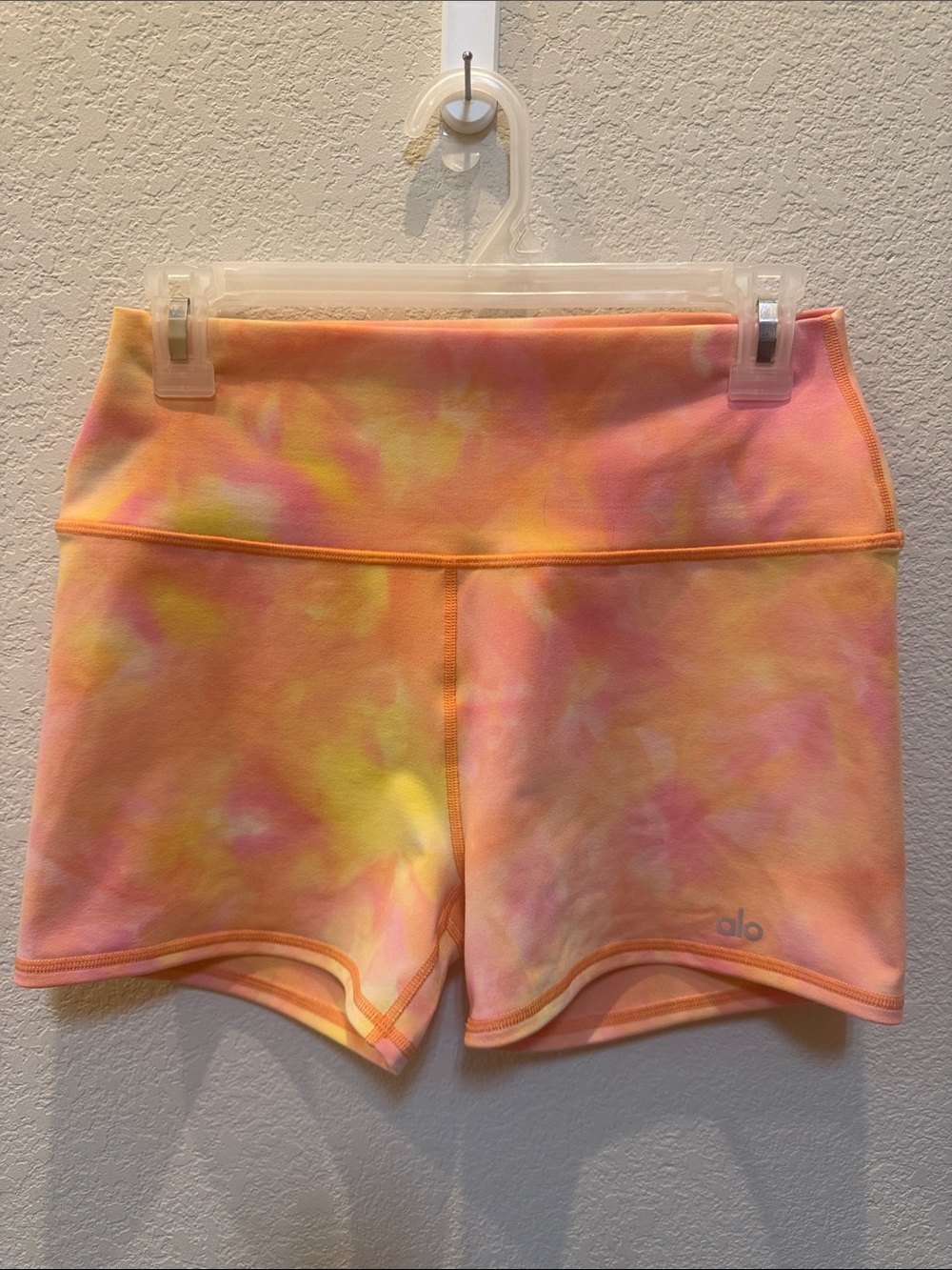 ALO Yoga Tie-Dye Bike Shorts in Peach, Yellow & Pink